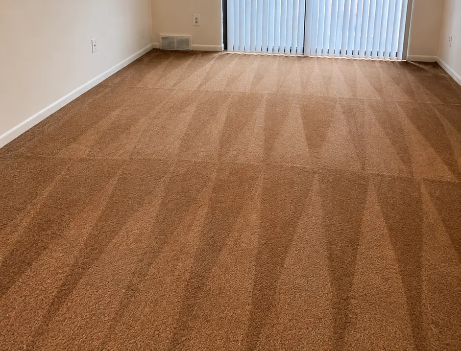 Clean carpet in a vacant managed unit after turnover service by Peace of Mind.